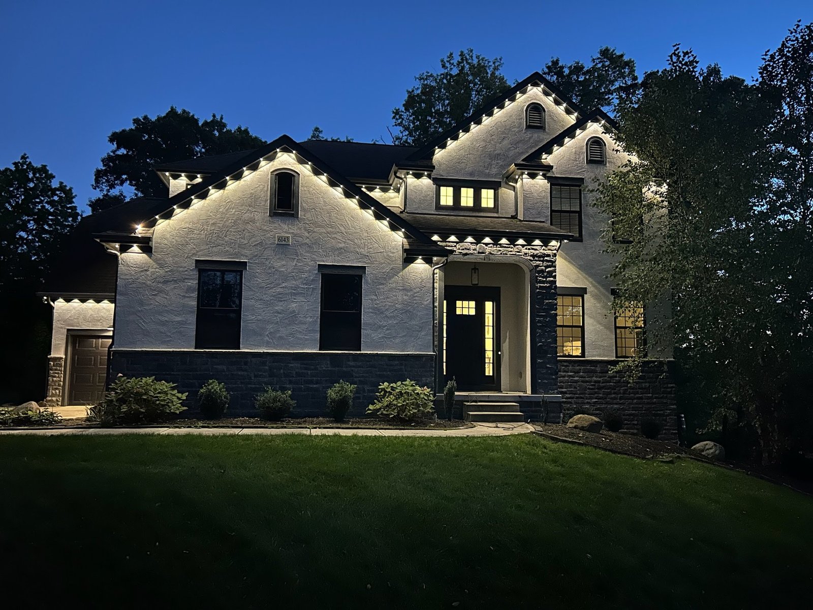 Permanent architectural lighting installation in warm white on a Columbus Ohio home